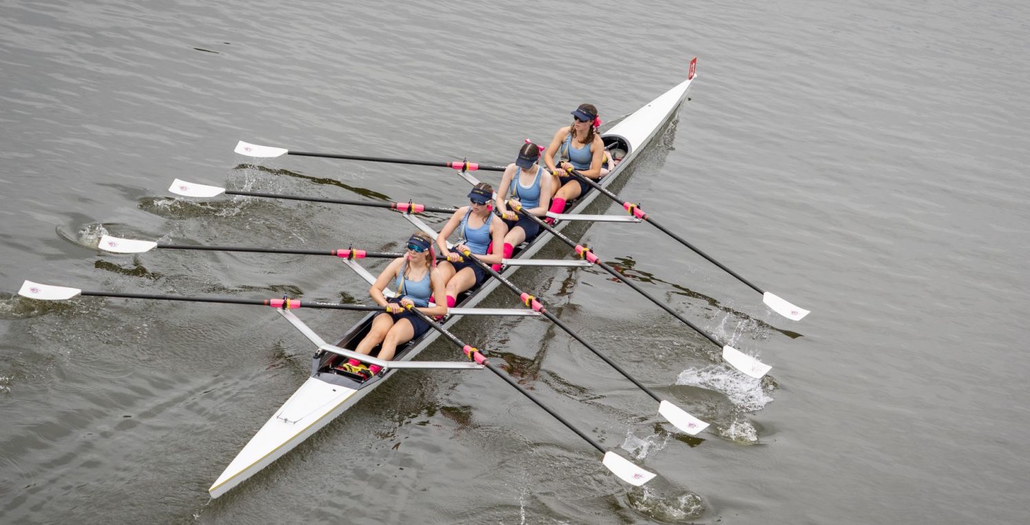 Rowing quad scull on river